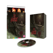The Woods Limited Edition Blu-Ray with slipcover, booklet, and disc featuring horror artwork and special features