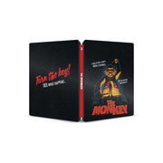 The Monkey Limited Edition Steelbook 4K Ultra HD + Blu-Ray packaging, featuring dark design with toy monkey and red text.