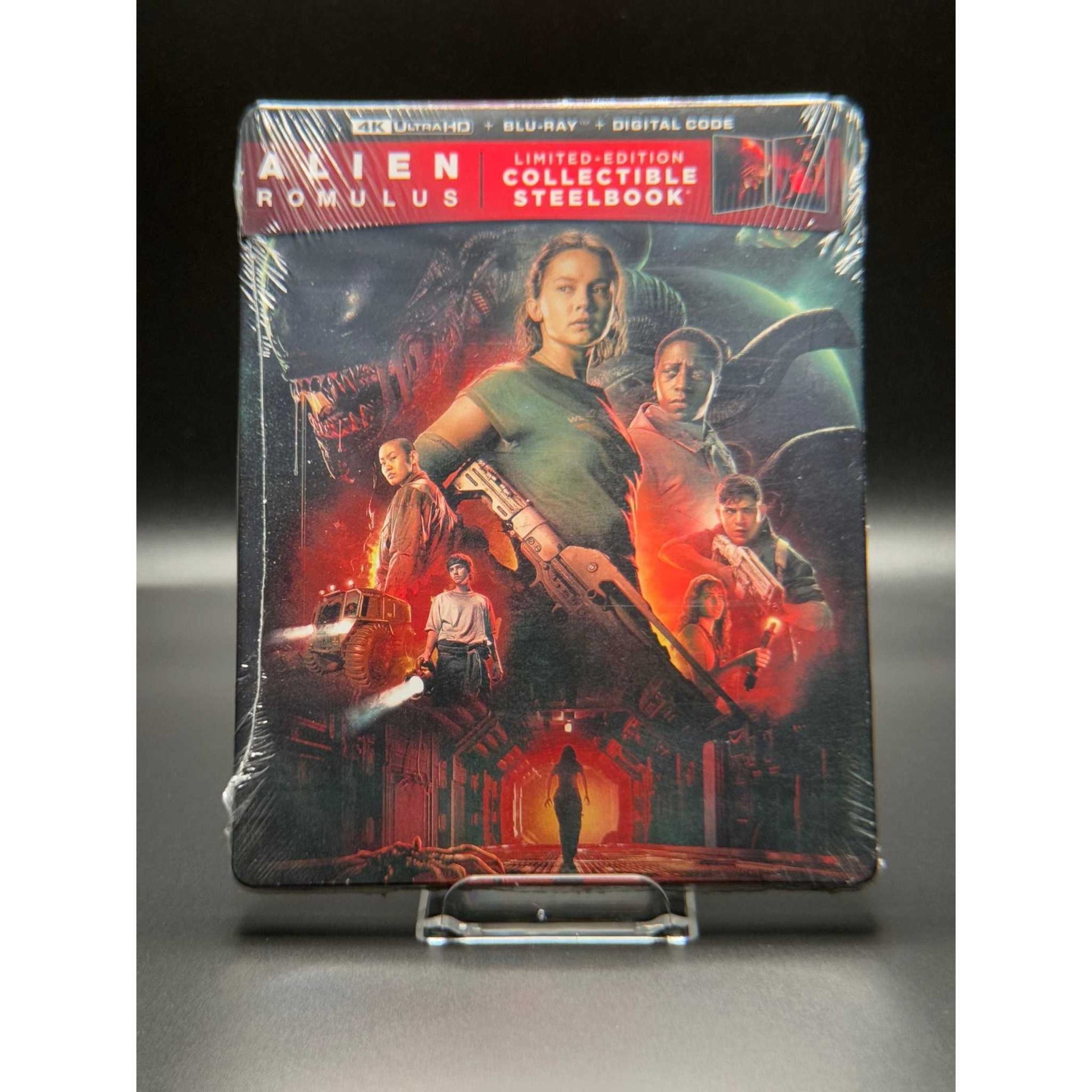 Alien: Romulus Limited Edition 4K UHD Steelbook with vibrant space-themed cover art.