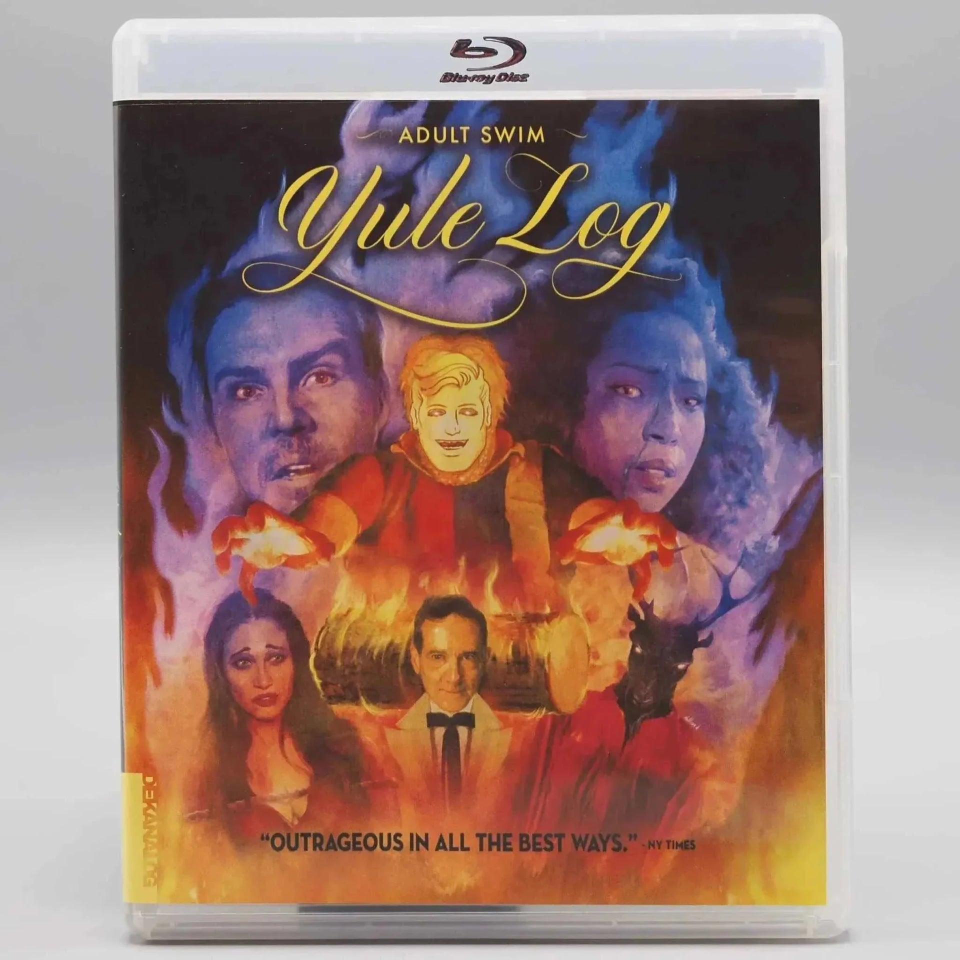 Dekanalog Adult Swim Yule Log Blu-ray cover featuring illustrated cast and fiery background