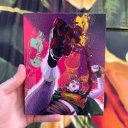 Hand holding Thrust! The Punk Cut! Blu-ray with striking punk-themed cover art featuring a rebellious character against a vibrant background