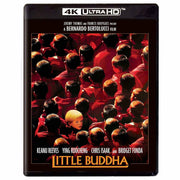 Little Buddha 4K UHD Blu-Ray cover featuring a boy surrounded by monks in red robes, starring Keanu Reeves and directed by Bernardo Bertolucci.