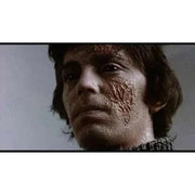 Vinegar Syndrome Labs Blu-Ray of Neither the Sea Nor the Sand with slipcover, featuring haunting scene from the film.