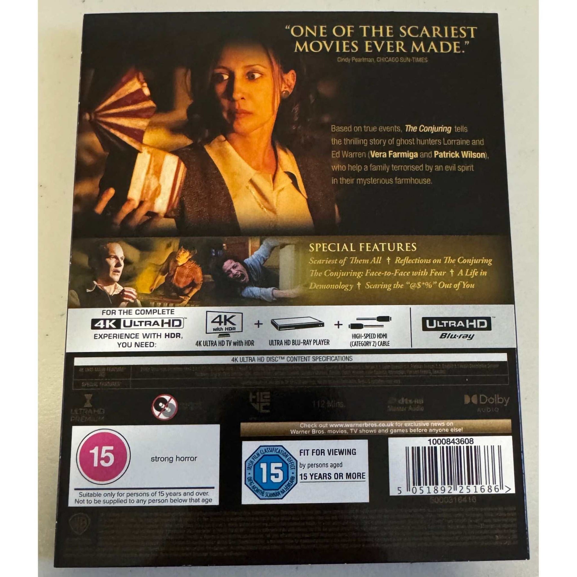 The Conjuring 4K Ultra HD and Blu-Ray UK edition horror movie slipcover packaging back cover with special features and age rating