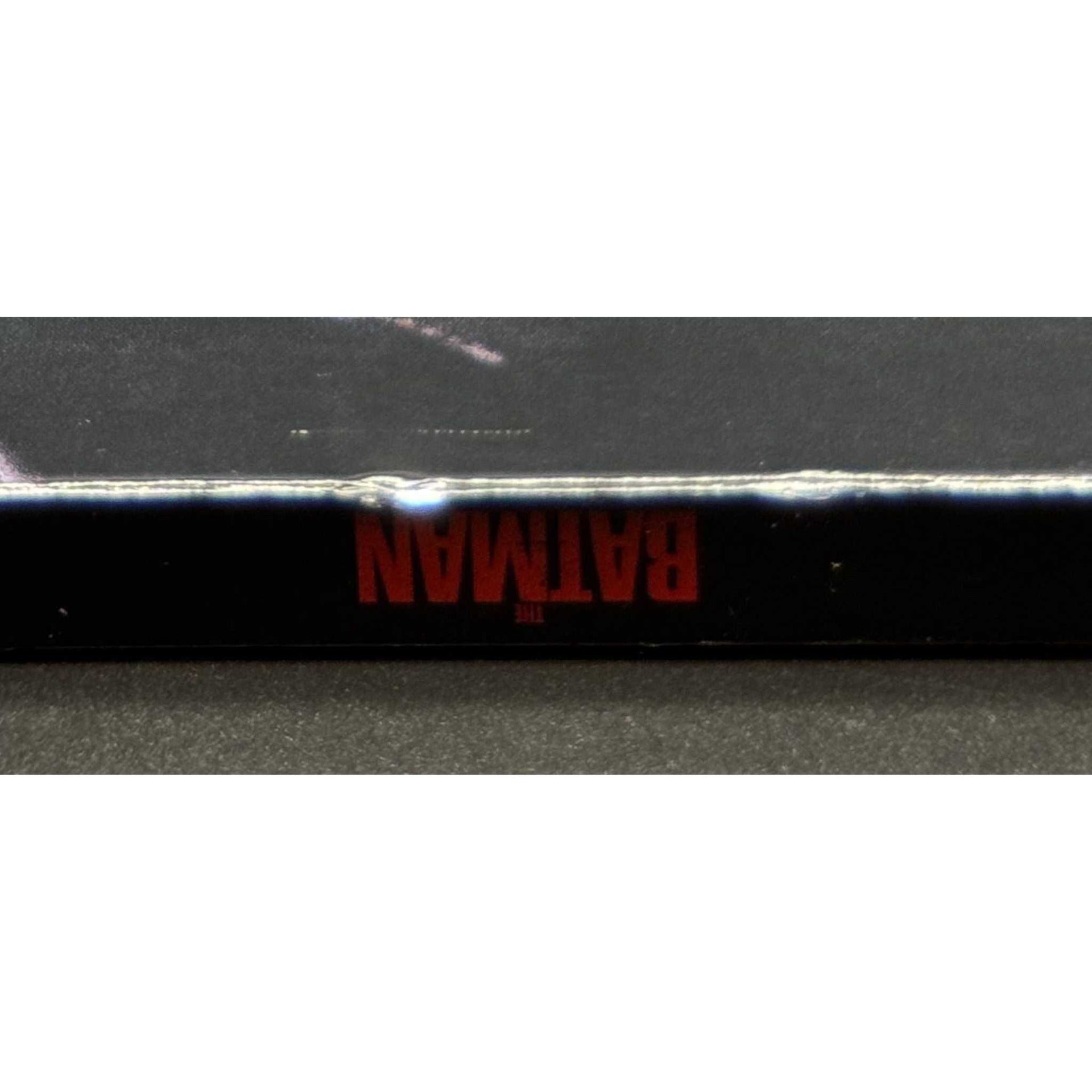 The Batman 4K UHD Blu-Ray used with slipcover showing wear and marks.