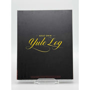 Dekanalog Adult Swim Yule Log Blu-Ray with black lenticular slipcover featuring gold script text on front.