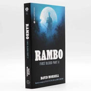 Paperback book cover of "Rambo: First Blood Part II Novelization" by David Morrell with a silhouette of Rambo against a full moon background.