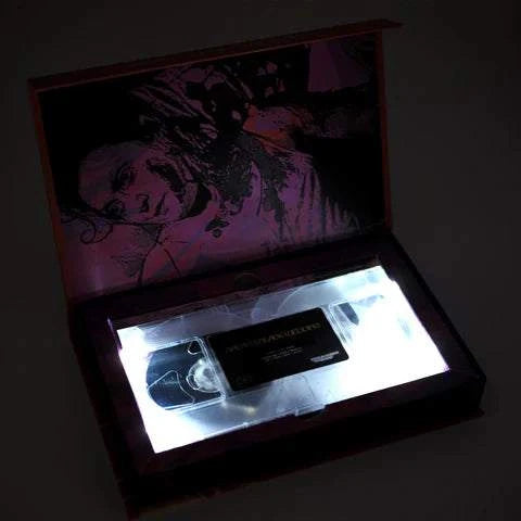 Limited edition deluxe LED VHS of "Satan's Black Wedding" in illuminated packaging.