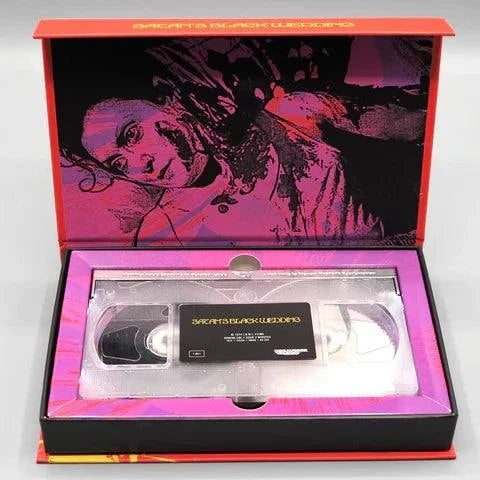 Limited Edition Deluxe LED VHS of "Satan's Black Wedding" with illustrated box and VHS tape displayed.