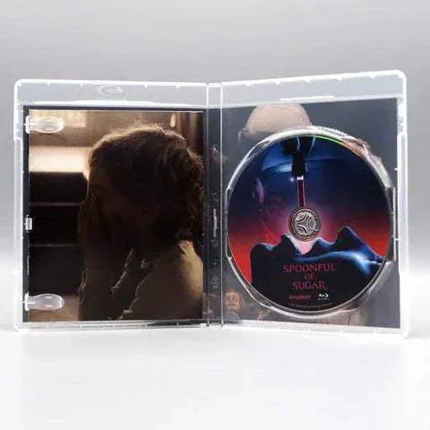 Spoonful of Sugar Blu-Ray with slipcover in an open case showing disc and cover art.