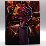 Fright Night Blu-Ray slipcover featuring vampire hand holding bitten apple with horror scenes background