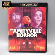 Vinegar Syndrome The Amityville Horror 4K UHD Blu-Ray slipcover featuring film characters and house.