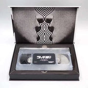Degausser Video - Divinity Limited Edition Deluxe LED VHS in open box with black and white design.
