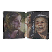 Open steelbook case showing internal artwork featuring characters from Drag Me to Hell movie