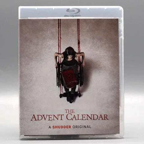 Shudder The Advent Calendar Blu-Ray with limited edition slipcover showing a woman in a wheelchair on a swing against a gray background