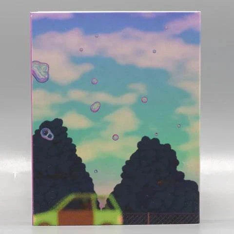 Limited edition Boys Go to Jupiter Blu-Ray with slipcover showing animated pastel sky and trees design.