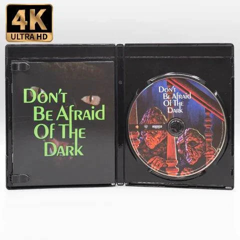 Don't Be Afraid of the Dark 4K UHD and Blu-ray disc in open case with green title text and creature artwork