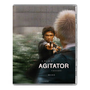 Underworld Chronicles Agitator Blu-ray cover showing a tense scene with a man pointing a gun at another person with blonde hair