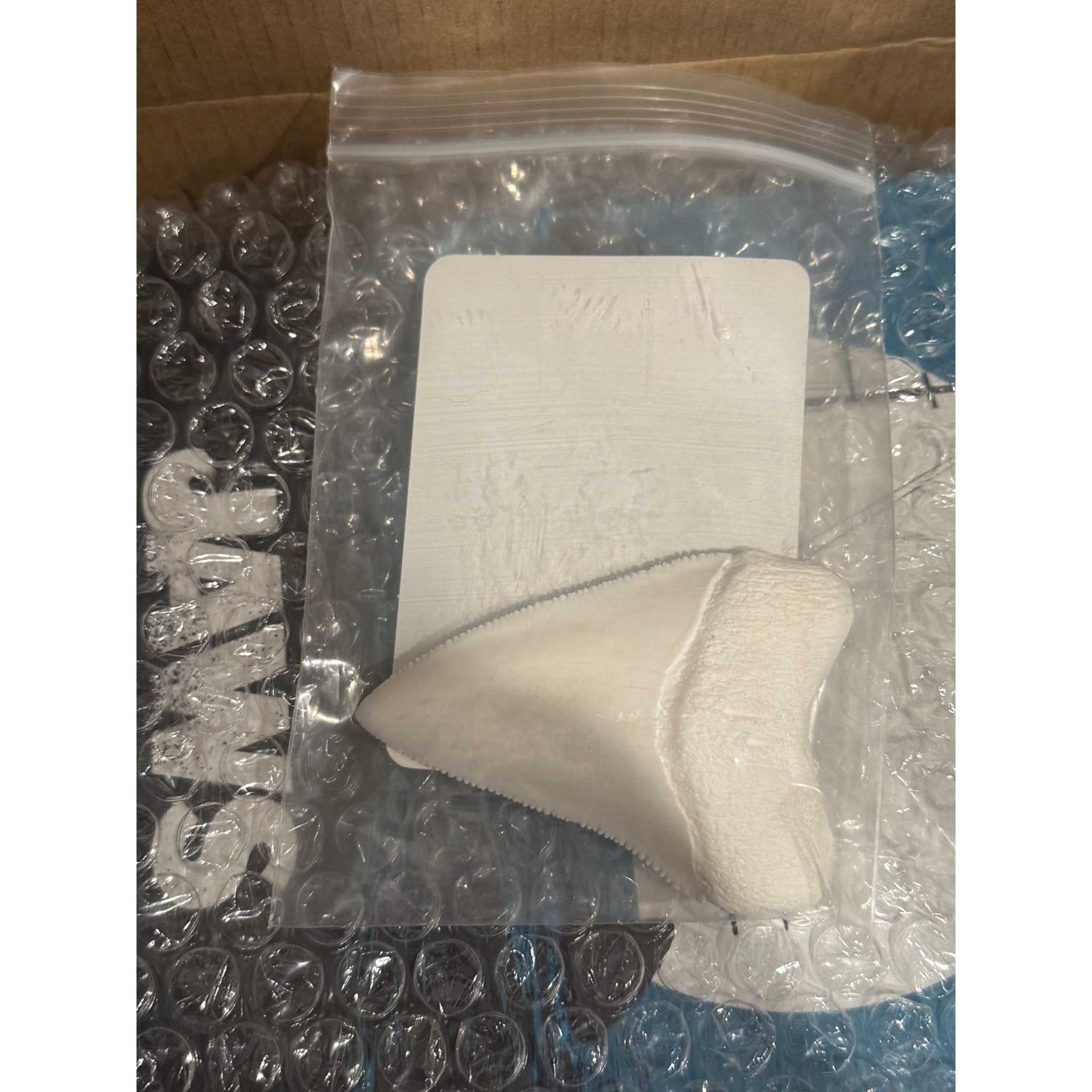 Jaws 4K UHD and Blu-Ray combo set with special tooth replica gift and protective packaging