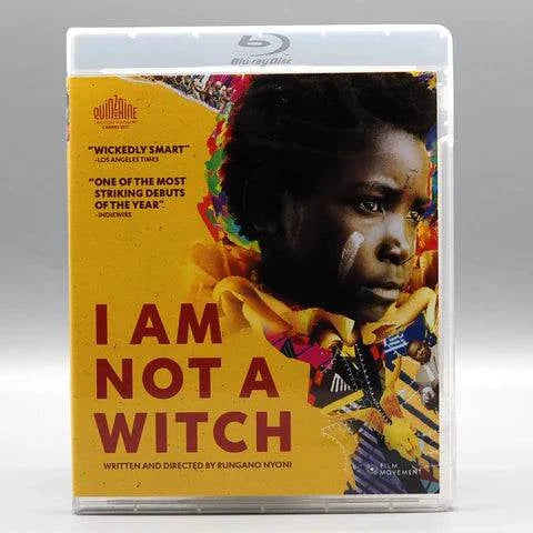 Film Movement I Am Not a Witch Blu-Ray cover featuring a thoughtful African girl with traditional face paint on a yellow background with colorful accents