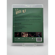 Vile 21 Blu-Ray (USED) with Slipcover, horror exploitation satire film by VHShitfest, very good condition with minor wear.