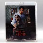 Shudder Sorry About the Demon Blu-Ray cover featuring haunted horror design with man and demon face