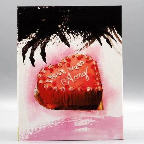 Shudder Sorry About the Demon Blu-Ray slipcover featuring a heart-shaped cake with "I Won't Need Amy" text and demon claws illustration
