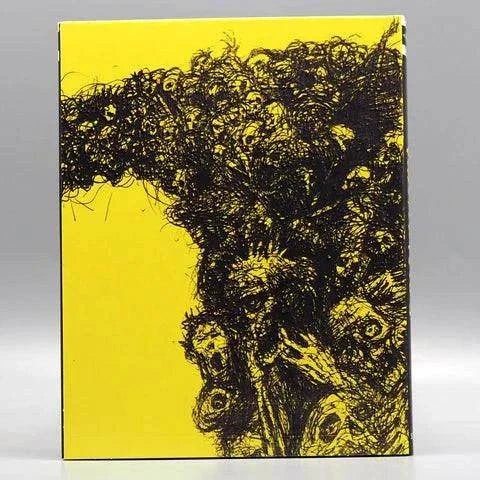 Saturn's Core Twisted Issues Blu-Ray with yellow and black abstract art slipcover.