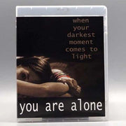 Blu-ray cover of "You Are Alone" with artistic image and promotional text.