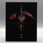 Music Box Selects You Are Not Me Blu-Ray with limited edition slipcover featuring dark artistic dog image on black background