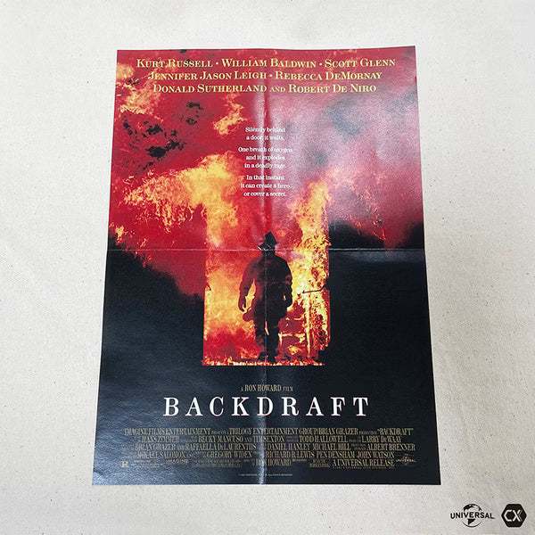Backdraft 30th Anniversary movie poster with firefighter silhouette and flames