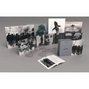Béla Tarr limited edition 8-disc Blu-ray box set with artwork, posters, and booklet displayed on grey background