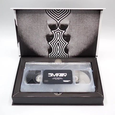 Degausser Video - Divinity Limited Edition Deluxe LED VHS in open box with black and white design.