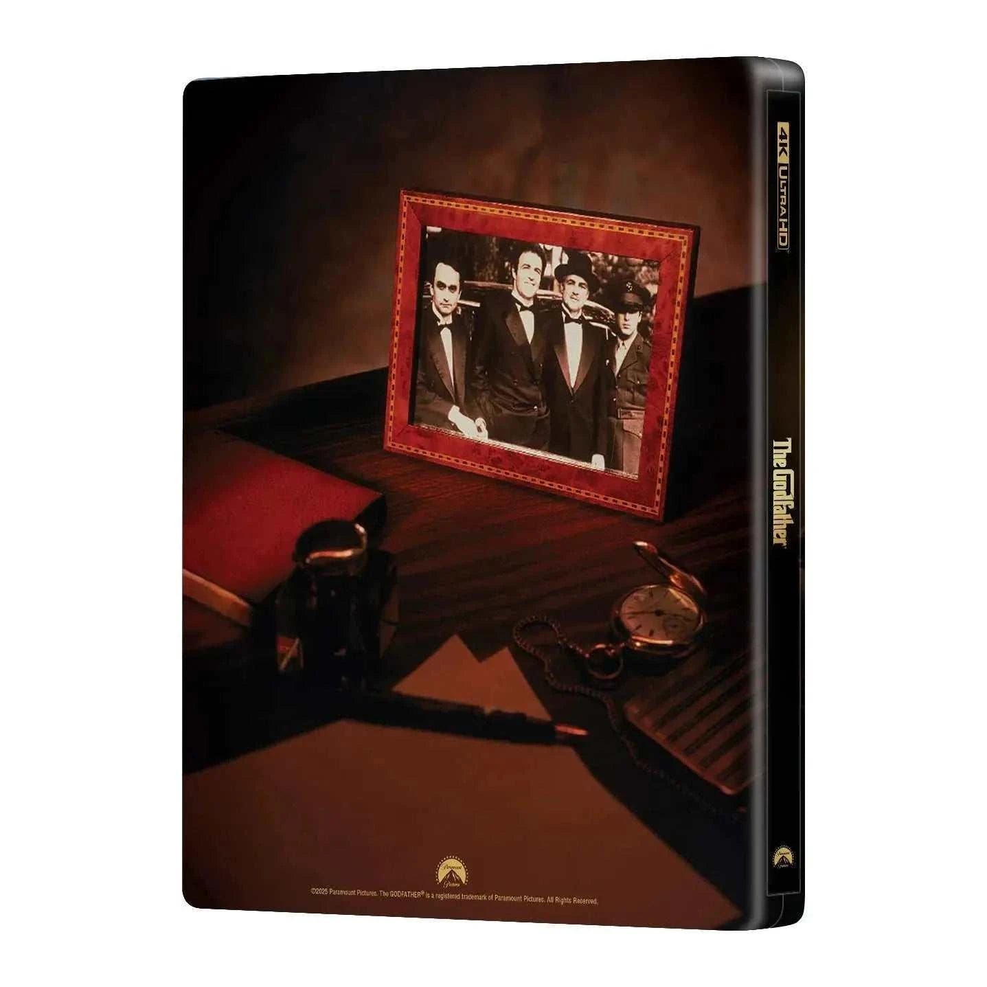 The Godfather Steelbook 4K UHD and Blu-Ray double lenticular full slip with framed photo and vintage accessories on table