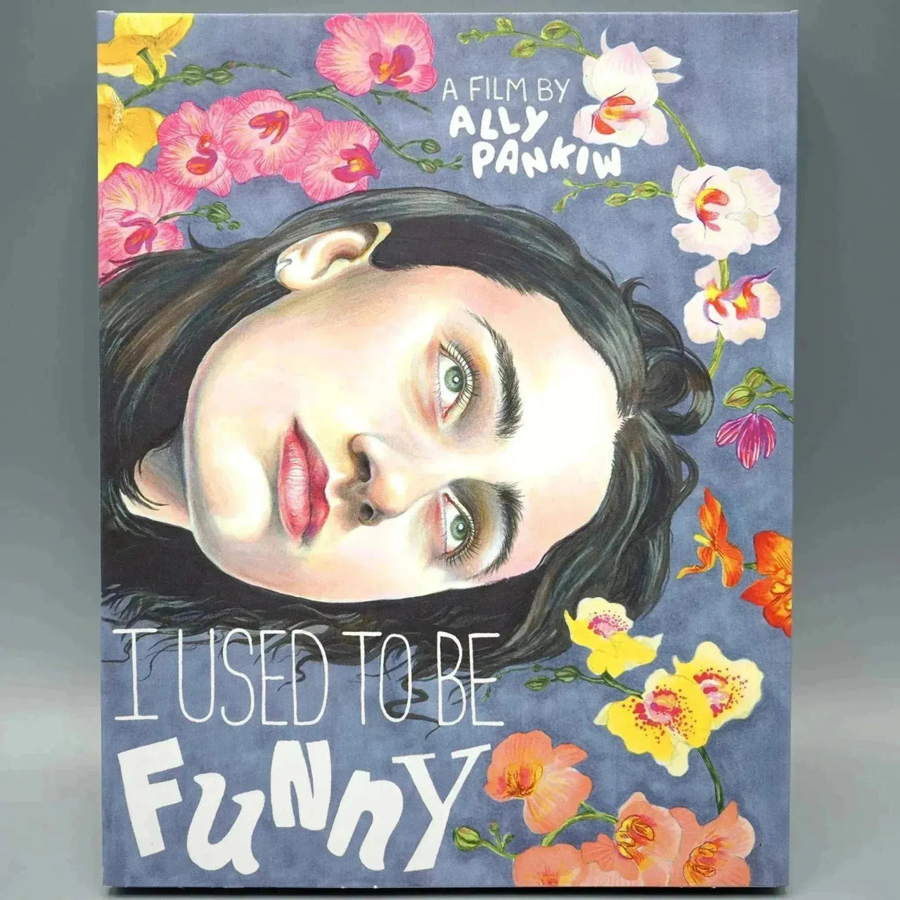 Blu-Ray cover of "I Used to Be Funny" featuring illustrated portrait with floral background.