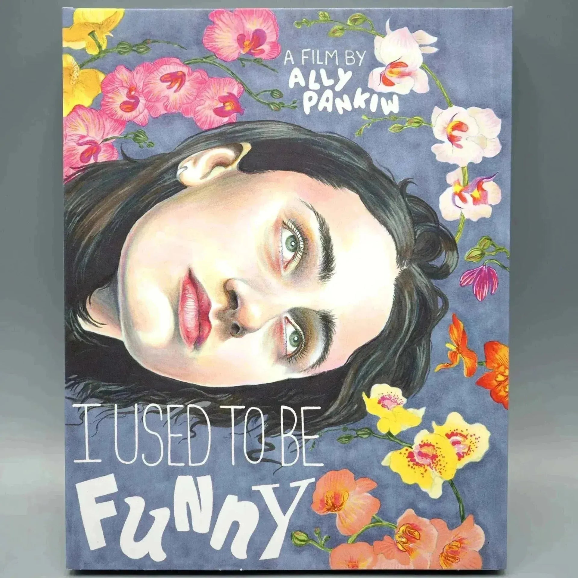 Blu-Ray cover of "I Used to Be Funny" featuring illustrated portrait with floral background.
