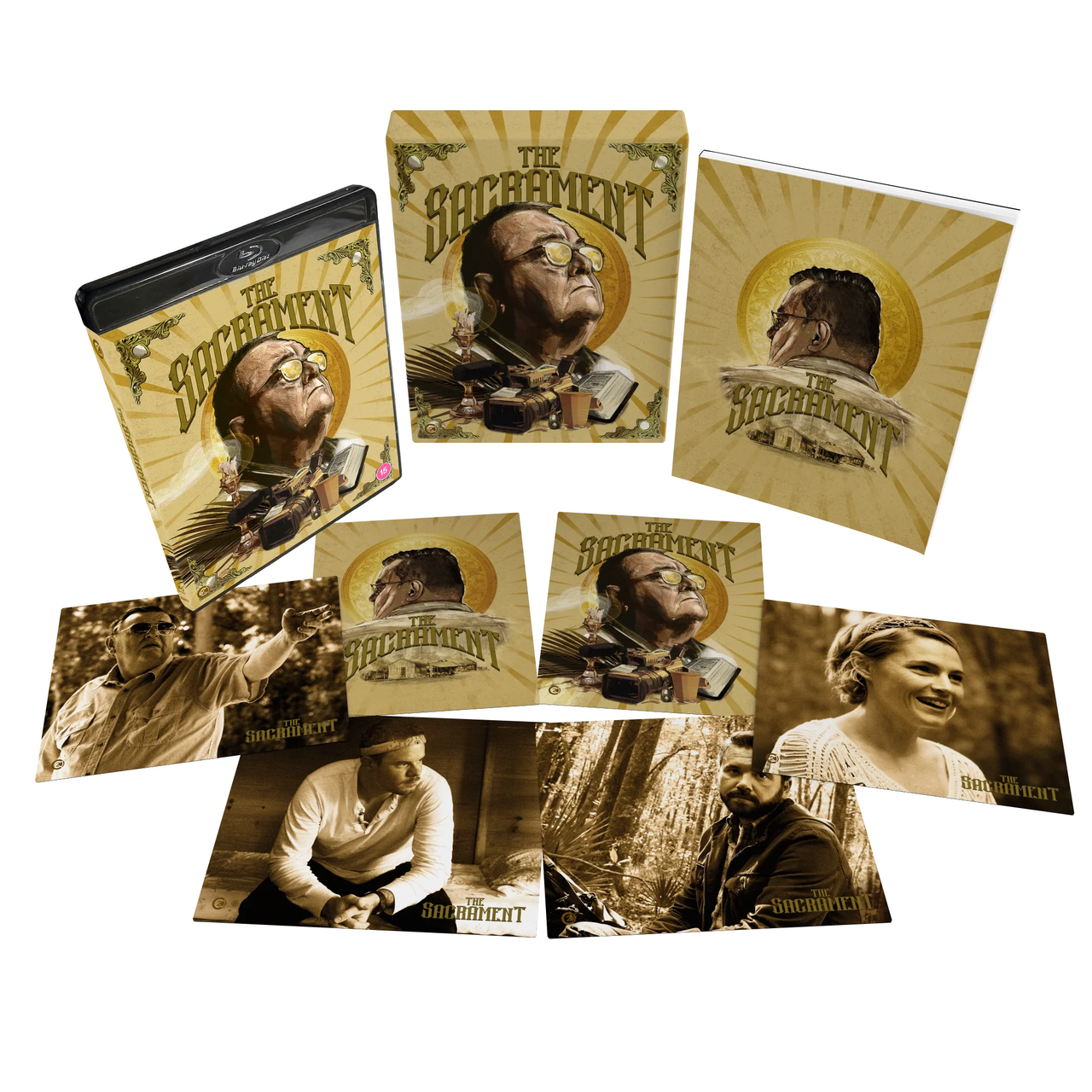 The Sacrament Limited Edition Blu-Ray with rigid slipcase, 70-page book, and collector's art cards laid out.
