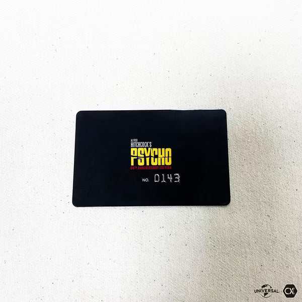 Psycho 60th Anniversary exclusive numbered card with black background and yellow Psycho logo