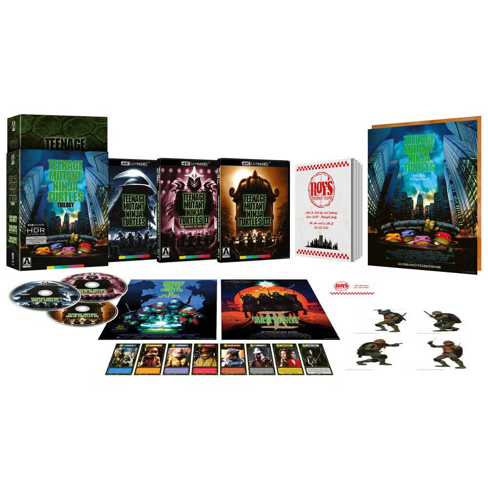 Teenage Mutant Ninja Turtles Trilogy 4K UHD limited edition box set with discs, booklet, posters, trading cards, and stickers