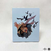 The Birds 4K UHD Blu-Ray limited edition steelbook with horror movie artwork and birds attacking woman