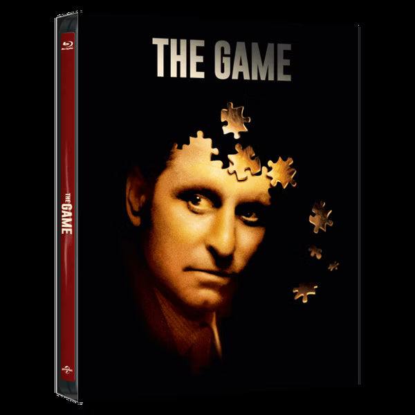 The Game Blu-Ray Limited Edition steelbook with full slip and art cards cover featuring a man's face with puzzle pieces missing