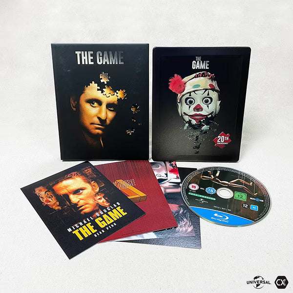 The Game Blu-Ray limited edition steelbook with full slip, art cards, and disc displayed on white background
